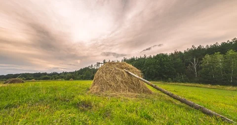 Stack of straw in a picturesque village Video stock 112651242