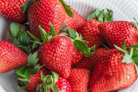 Stack of strawberries in a cup Stock Photos