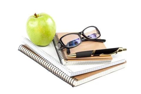 Stack stylish notebook, pen and glasses Office or school supplies Stock Photos