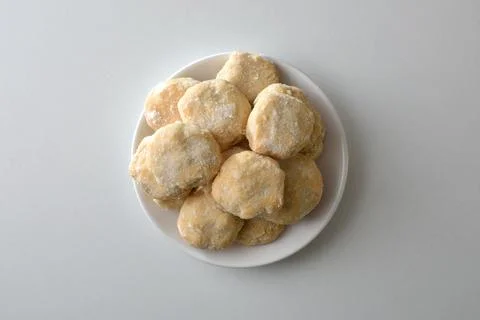 Stack of sugar cookies on plate isolated in the center Stock Photos