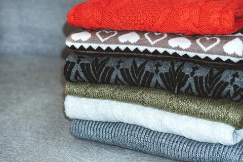 Stack of sweaters, jumpers Stock Photos