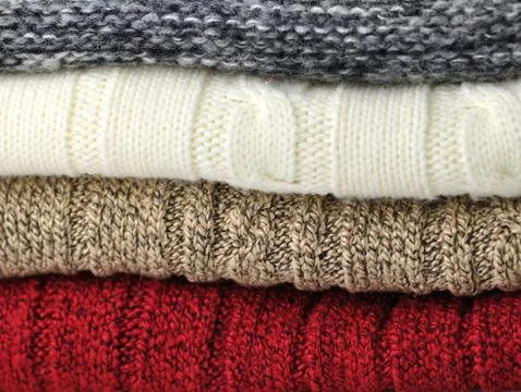 Stack of sweaters Stock Photos