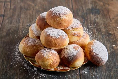 Stack of Sweet Buns Dusted with Powdered Sugar Stock Photos