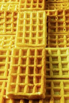 A stack of sweet square soft waffle desserts from above Fotos Stock