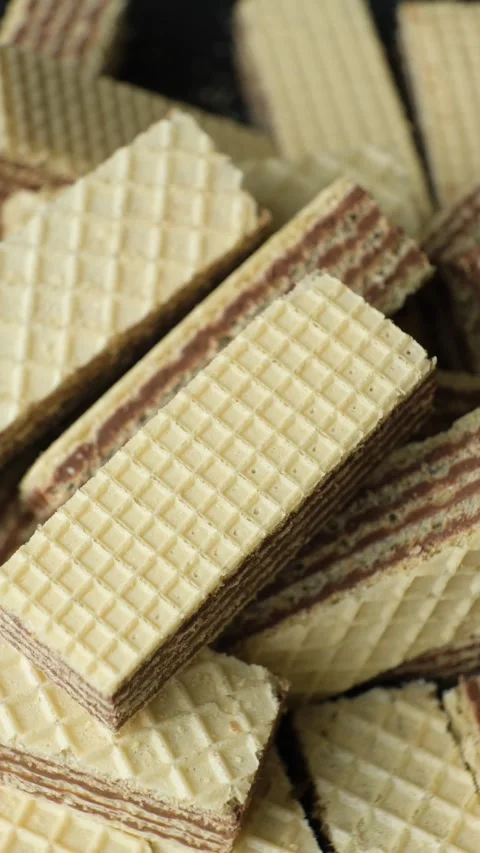Stack of sweet wafers with chocolate cocoa cream rotating Stock Footage 347276527