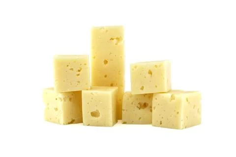 Stack of Swiss cheese cubes isolated on white background A stack of Swiss ... Stockfoto's