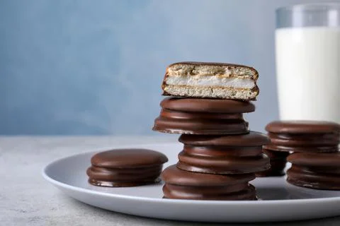 Stack of tasty choco pies on grey table Stockfoto's