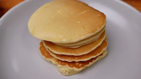 Stack of tasty pancakes on the plate for breakfast. Stock Footage 158661325