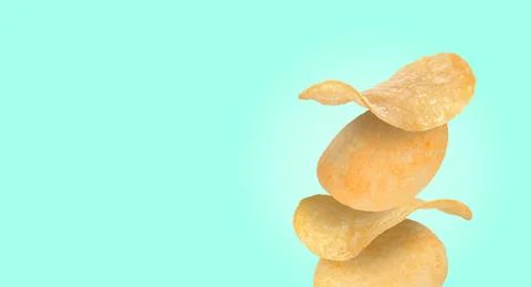 Stack of tasty potato chips on turquoise background, space for text Stock Photos