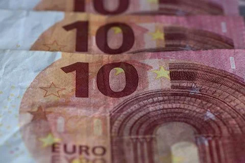 Stack of ten euro bills representing European currency Stock Photos