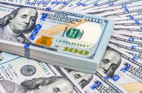 Stack of ten thousand american dollars close up. Fragment Stock Photos