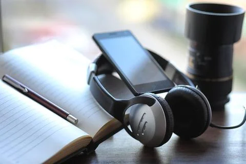 A stack of textbooks headphone Stock Photos
