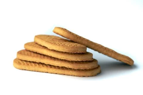 Stack of textured brown cookies isolated on white background Stock Photos