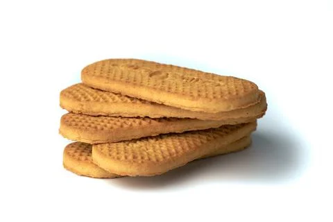 Stack of textured brown cookies isolated on white background Stock Photos