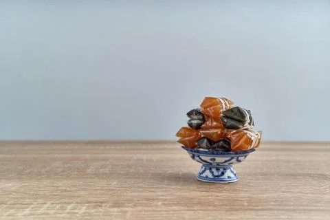 Stack Thai caramel or Kalamare with sesame on pedestal tray Stock Photos