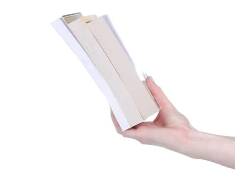 Stack thin books in hand Stock Photos