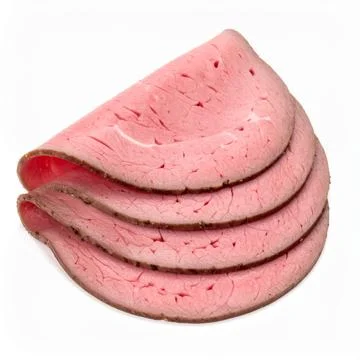 Stack of Thinly Sliced Cooked Roast Beef Deli Meat, Lean Red Protein Isolat.. Stock Photos