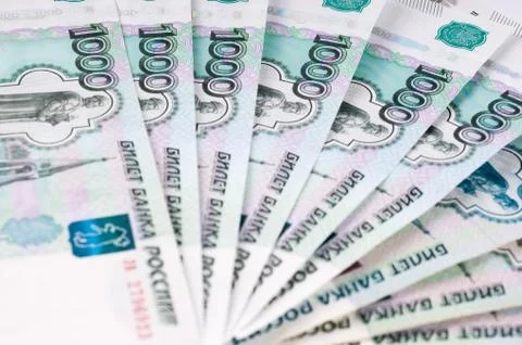 A stack of thousand-ruble banknotes, spread out money. Russian currency Stock Photos