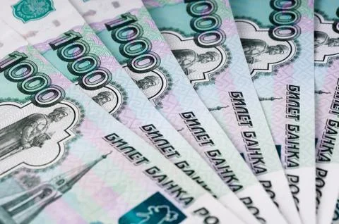 A stack of thousand-ruble banknotes, spread out money. Russian currency Stock Photos