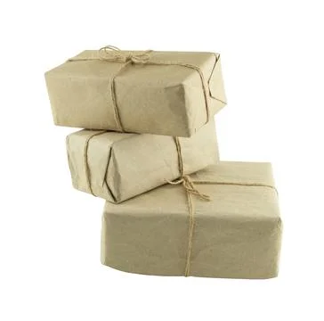 Stack of three brown uneven giftbox on isolated background Stock Photos