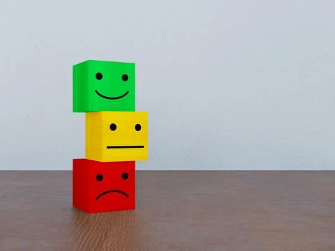 Stack of three colorful wooden cubes showing happy neutral and sad facial e.. Stock Photos