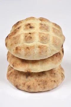 Stack of three fresh flatbreads on white background 스톡 사진