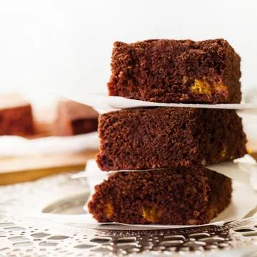 Stack three pieces of homemade chocolate brownies. Dark Chocolate cake Stock Photos