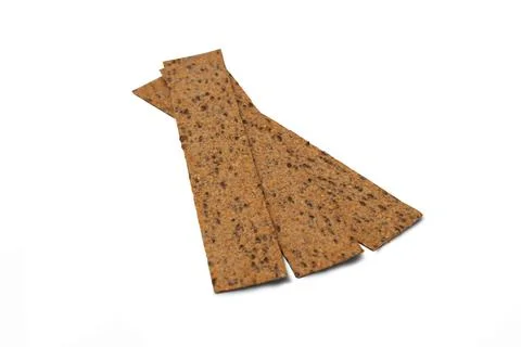 Stack of three rectangular bread crisps isolated on white background. Top vie Foto stock