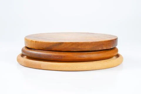 Stack of three round wooden cutting boards Stock-Fotos