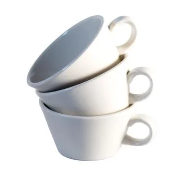 Stack of three small white coffee cups Stock Photos