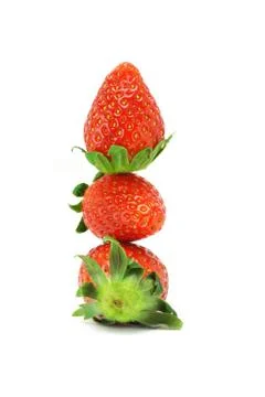Stack of three strawberries Stock Photos