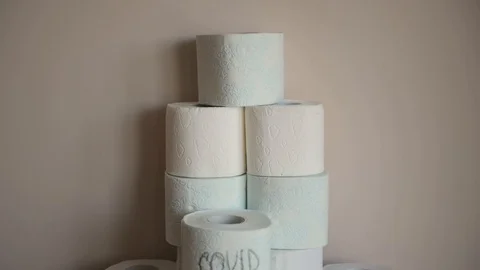 Stack of toilet paper rolls rotating . Coronavirus or COVID 19. Epidemic situ Stock Footage 127692886