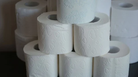Stack of toilet paper rolls rotating . Coronavirus or COVID 19. Epidemic situ Stock Footage 127692901