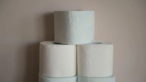 Stack of toilet paper rolls rotating . Coronavirus or COVID 19. Epidemic situ Stock Footage 127692903