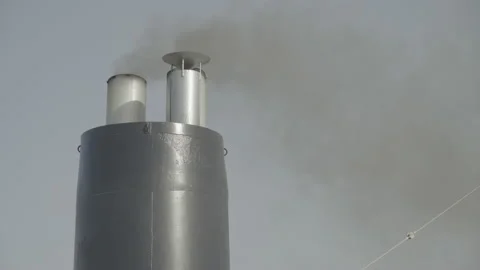 A stack on a tourist ferry emitting black fumes Stock Footage 238843187