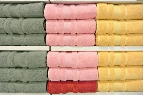 Stack of towels in the closet Stock Photos