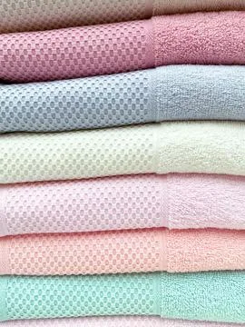 Stack of towels. colorful Turkish towels. colored terry Stock Photos
