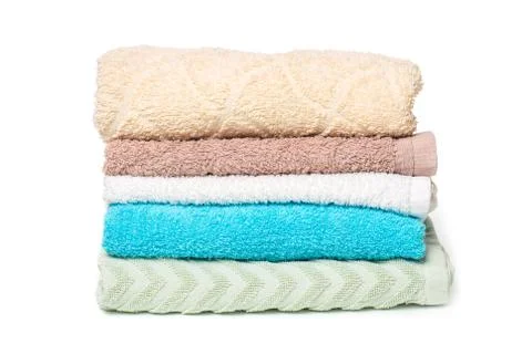 Stack of towels isolated on white background Stock Photos
