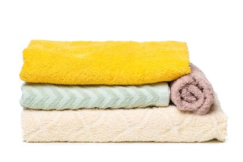 Stack of towels isolated on white background Stock Photos