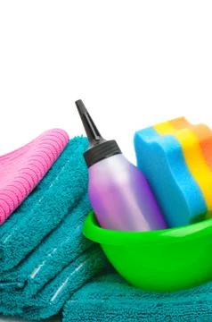 Stack of towels, napkins, sponge, cleaning supplies Stock Photos