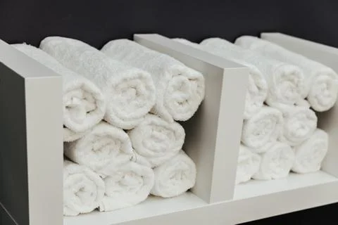 Stack of towels on simple background Stock Photos