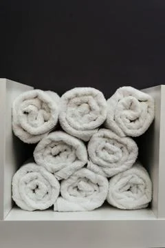 Stack of towels on simple background Stock Photos