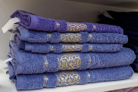 A stack of towels. Textile industry. Bath accessories. Retail trade Stock Photos