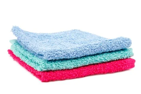 Stack of towels on a white background Stock Photos