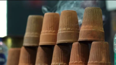 Stack of Traditional Clay Cups for Indian Tea Served at Local Market Stock Footage 339724868