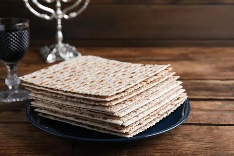 Stack of traditional matzos on wooden table 写真素材