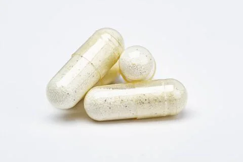 Stack of transparent pills multiple transparent pill, with white and black... Stock Photos