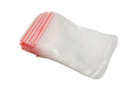 Stack of transparent plastic ziplock bags on white background. Empty reseal.. Stock Photos