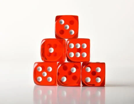 Stack of transparent red gambling dice all numbers front view Stock Photos