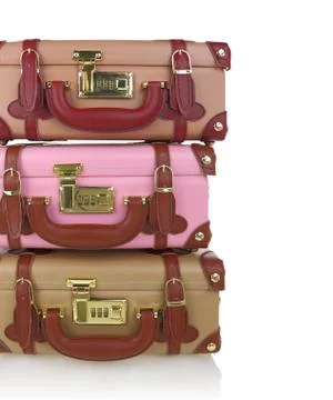Stack of travel suitcases isolated on white Stock Photos